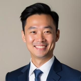 Professional headshot of Alvin Tan, Founder & Lead Designer.